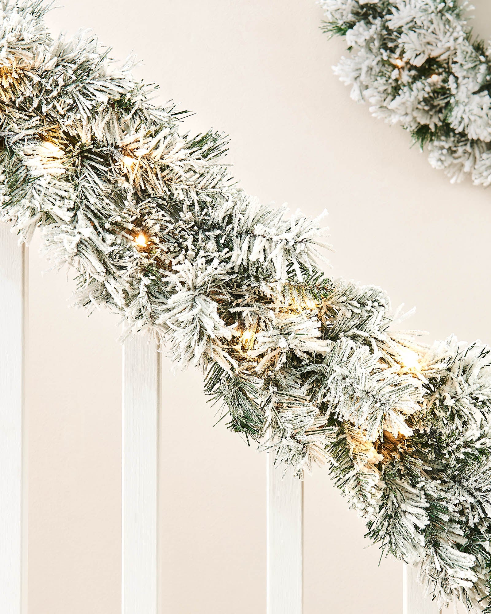 Pre-Lit Snow-Flocked Spruce Garland, 9 ft
