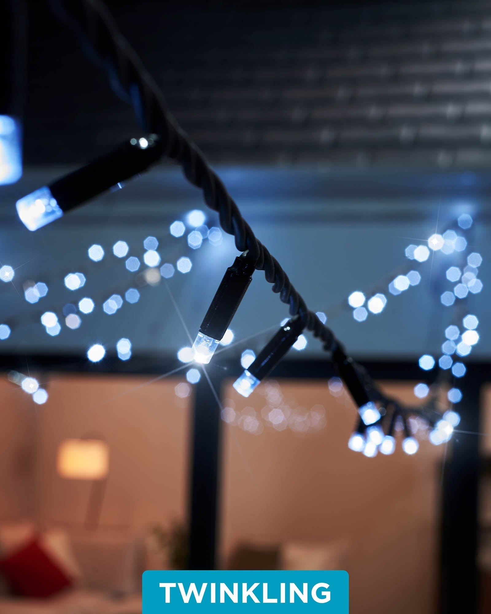 Close-up of white LED string lights with a focus on the 'TWINKLING' feature, showing the lights in an on and off state, creating a twinkling effect.