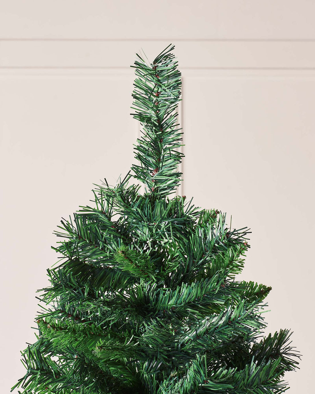 A lush, full-bodied artificial Christmas tree with dense green pine foliage, designed for both indoor and sheltered outdoor settings. The Mixed Pine Promo Christmas Tree blends classic holiday charm with a sturdy, space-efficient build—ideal as a festive centerpiece or decorated canvas for personal holiday styles.