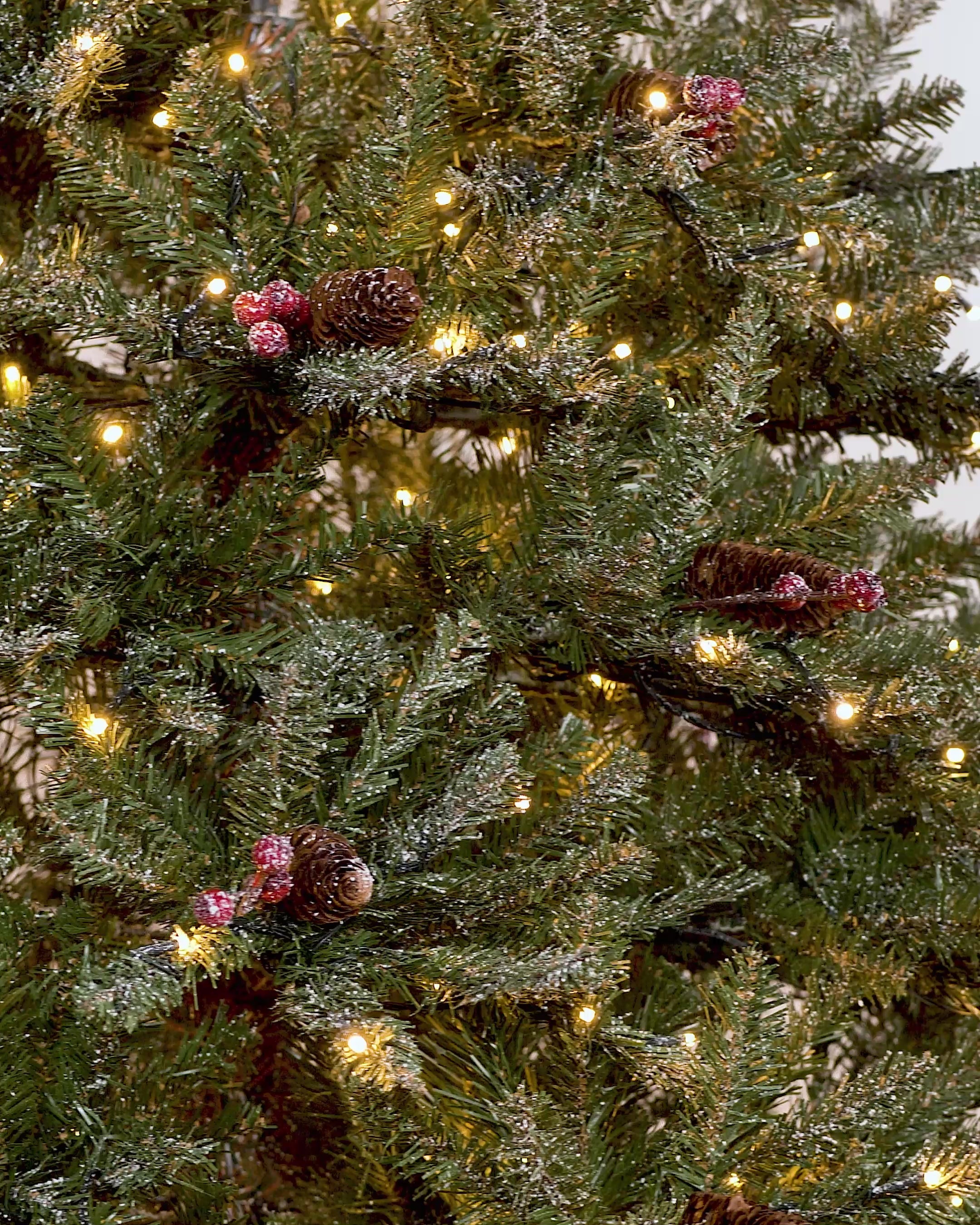 Load video: Pre-Lit Full Bodied Decorated Frosted Christmas Tree, 7 ft