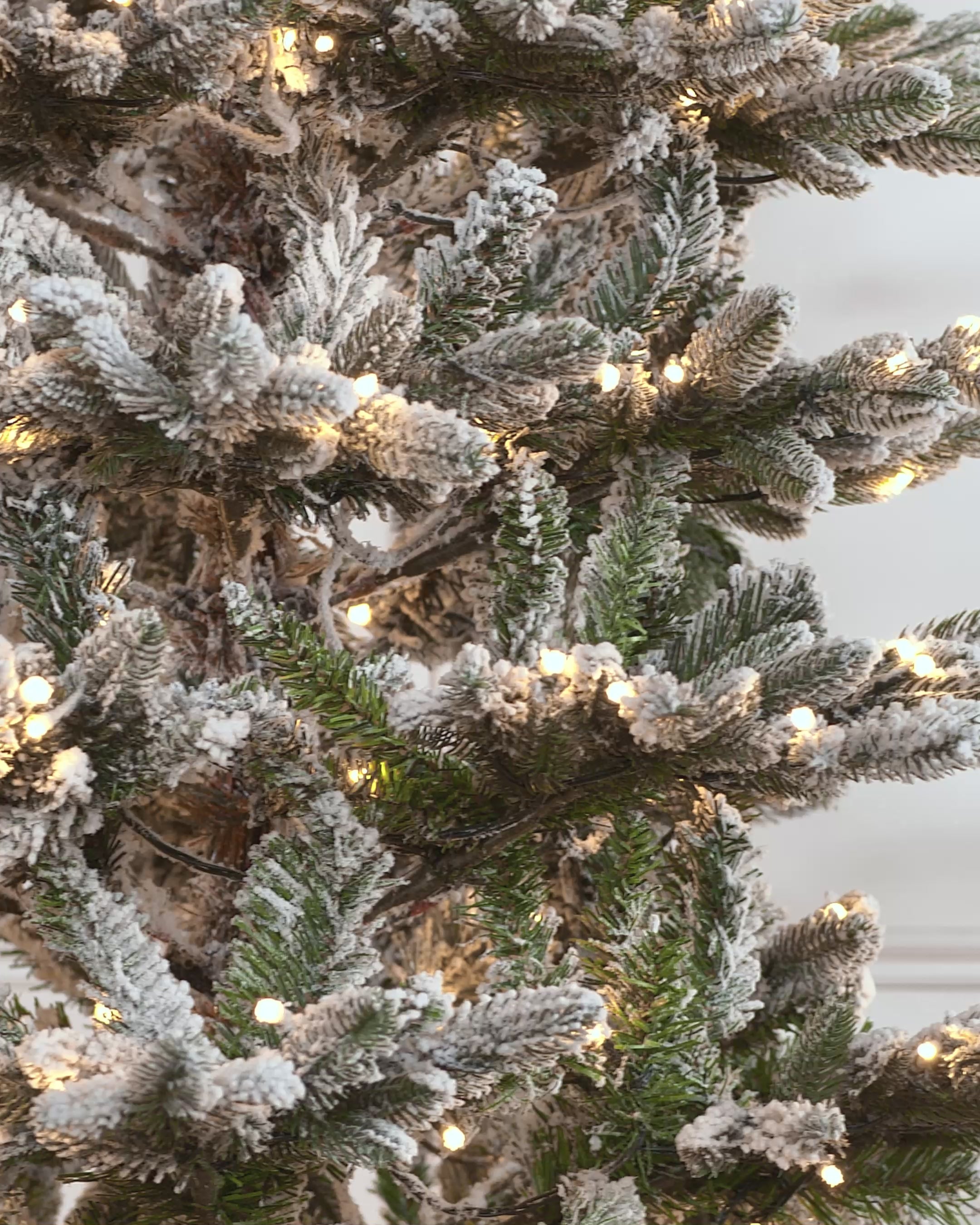 Load video: Pre-Lit Slim Snow Flocked Christmas Tree, 7 ft