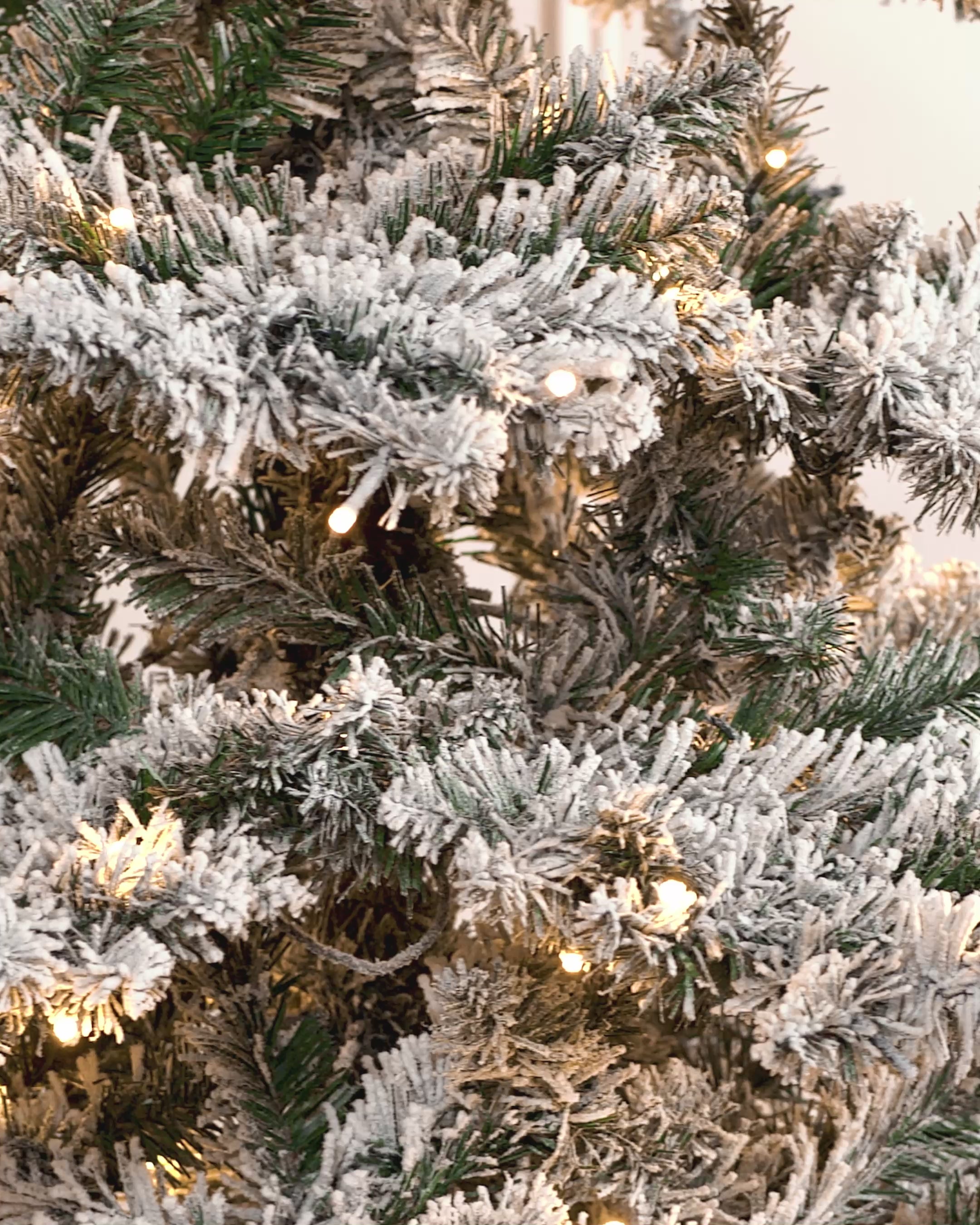 Load video: Pre-Lit Snow Flocked Alpine Christmas Tree, 7 ft