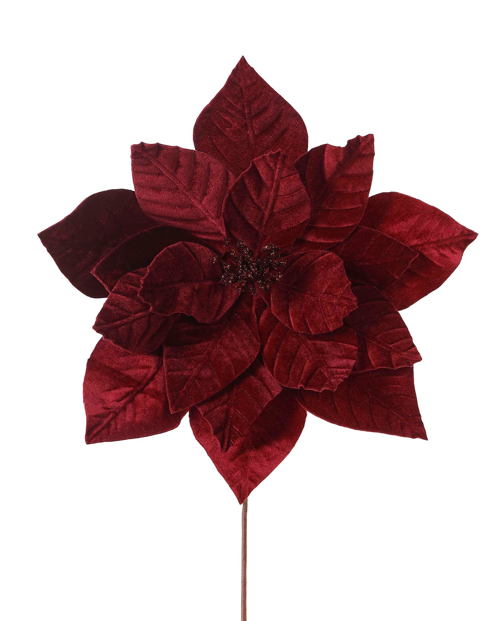 Artificial burgundy poinsettia flower with a stem, isolated on a white background.
