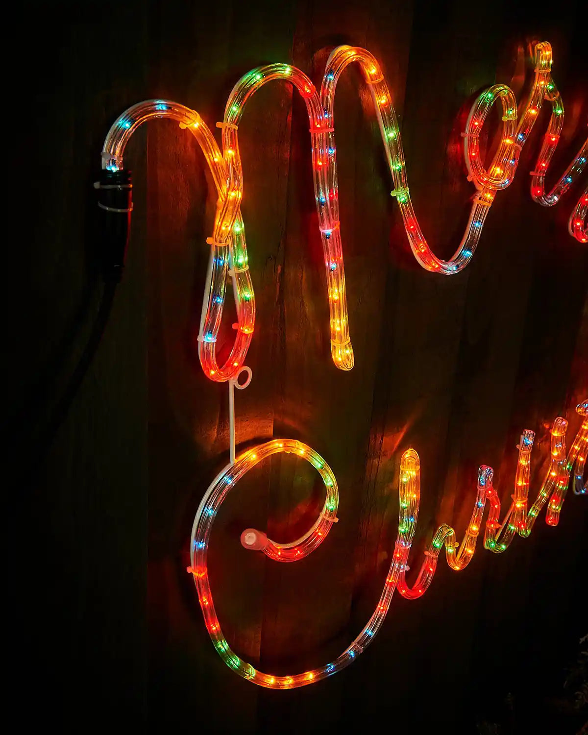 Close-up of the multi-coloured Merry Christmas rope light lettering