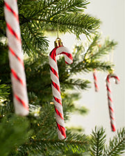 13cm red and white candy cane baubles hanging on a Christmas tree