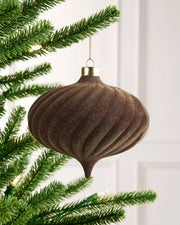 15 cm Mocha oversized velvet Spiral bauble hanging from a Christmas tree with a gold cap.
