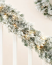 Pre-Lit Snow-Flocked Spruce Garland, 9 ft