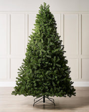 A 8-foot tall mixed pine artificial Christmas tree with a foldable black metal base.