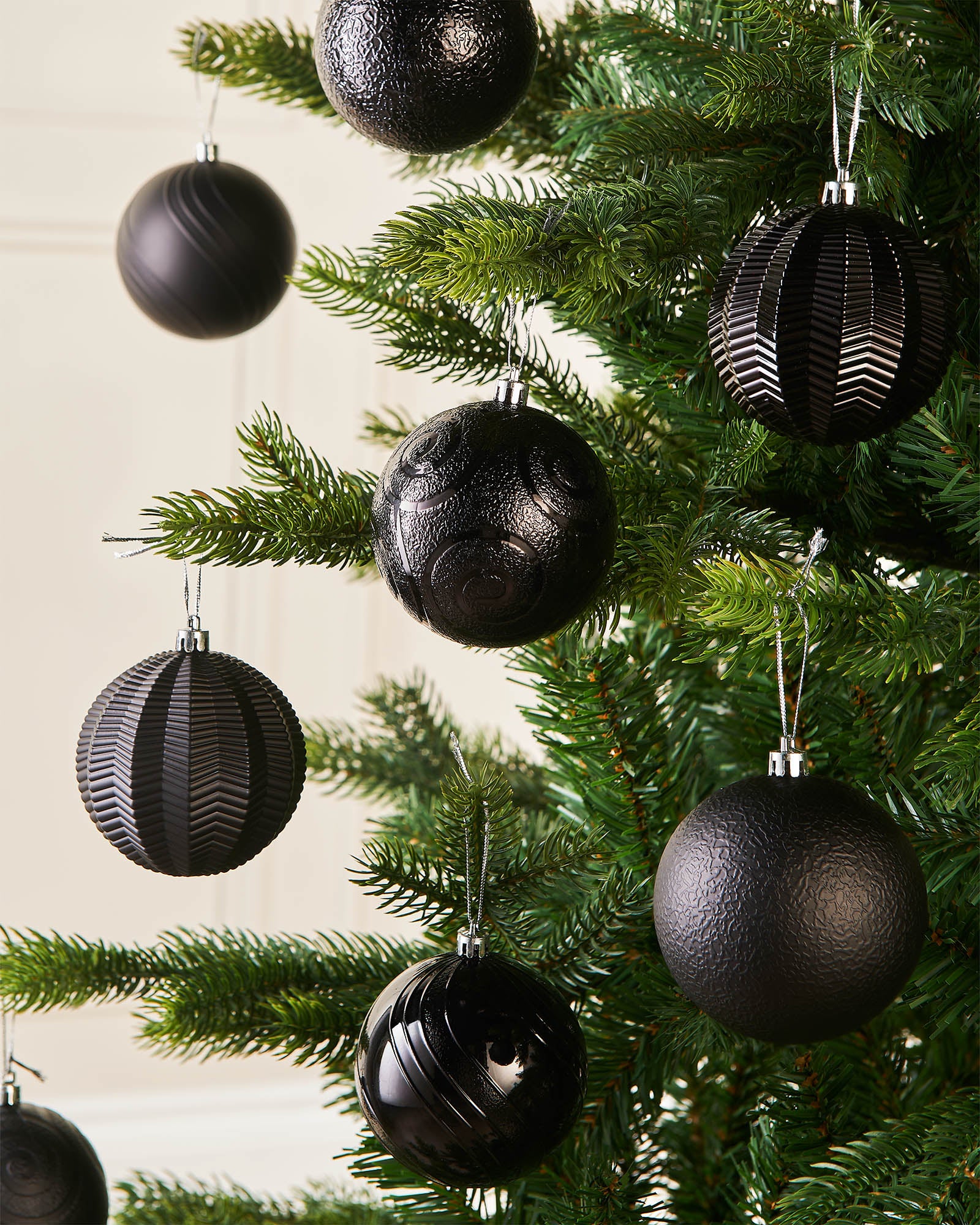 Sixteen Black Shatterproof Baubles, 8 cm