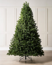 A 8-foot tall mixed pine artificial Christmas tree with a foldable black metal base.