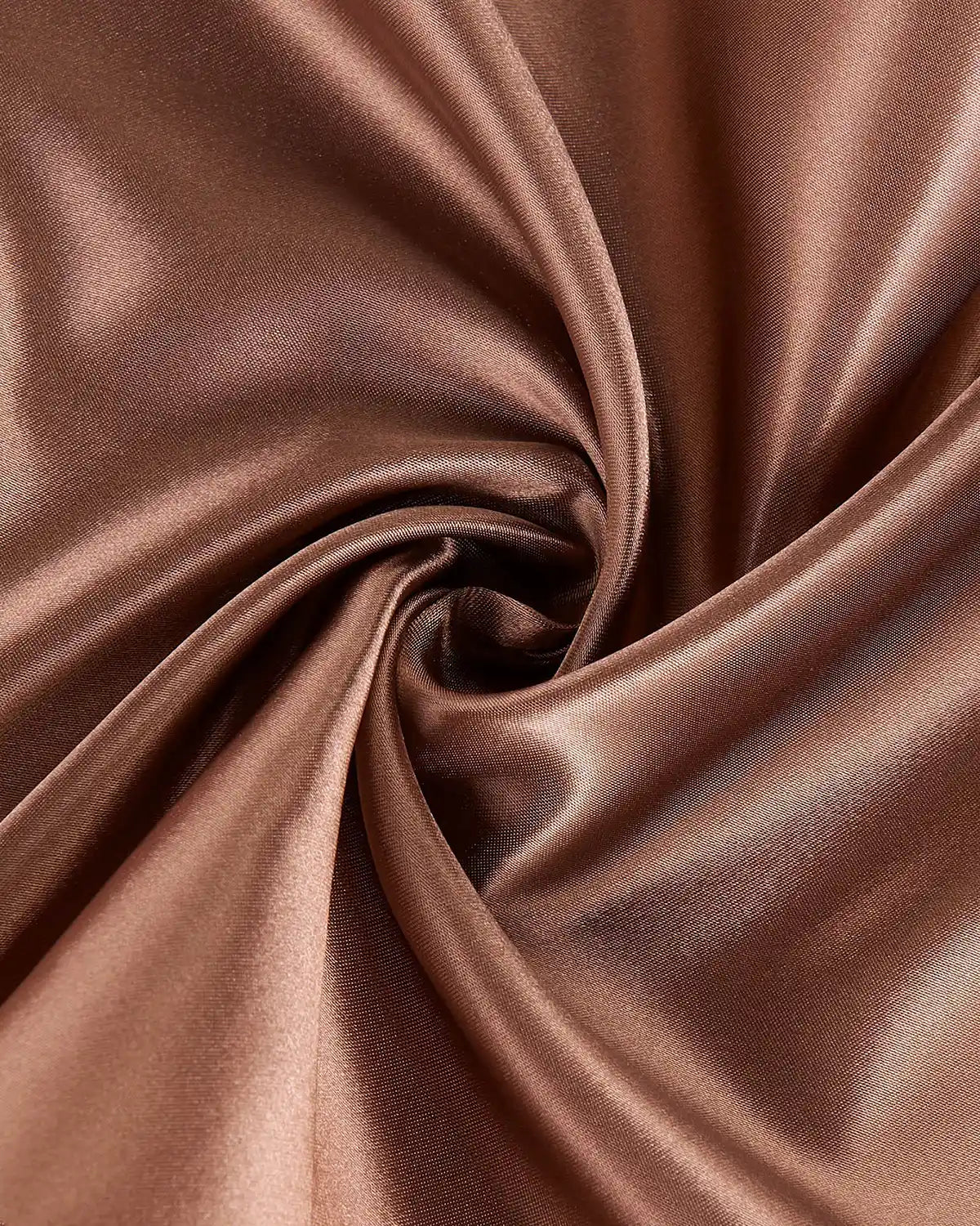 Close-up of mocha satin ribbon showing the smooth sheen and folded fabric texture.
