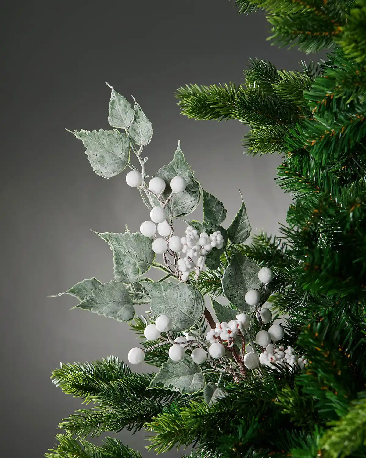 25 cm white artificial frosted berries pick styled in a Christmas tree