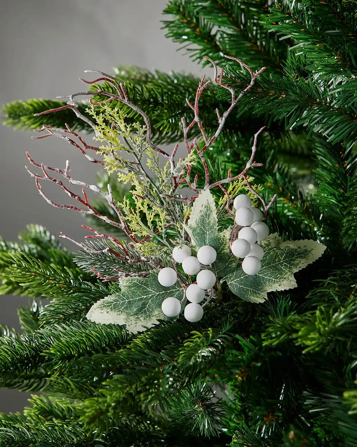 31 cm white artificial frosted berries pick styled in a Christmas tree