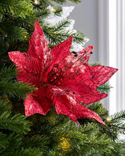 Red artificial poinsettia flower styled in a Christmas tree
