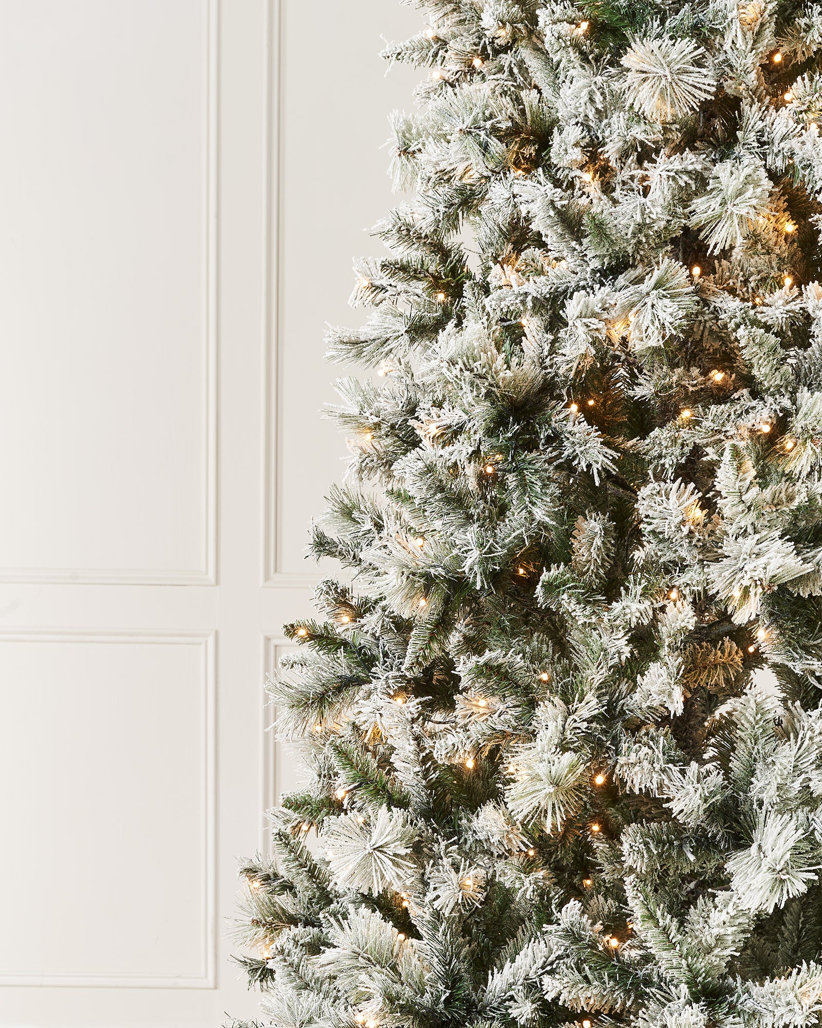 Pre-Lit Slim Snow Flocked Spruce Christmas Tree, 9 ft