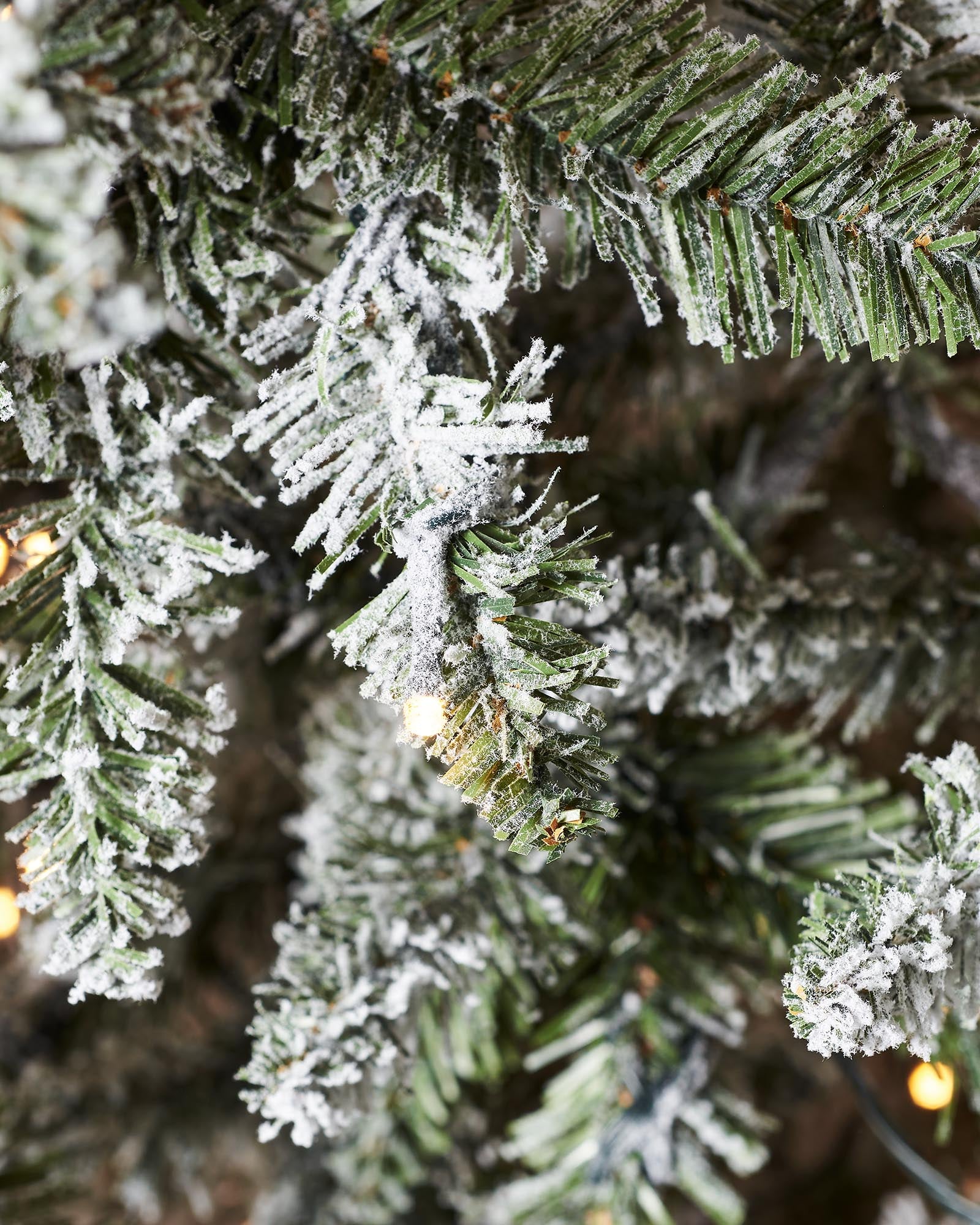 Pre-Lit Full Bodied Snow Flocked Christmas Tree
