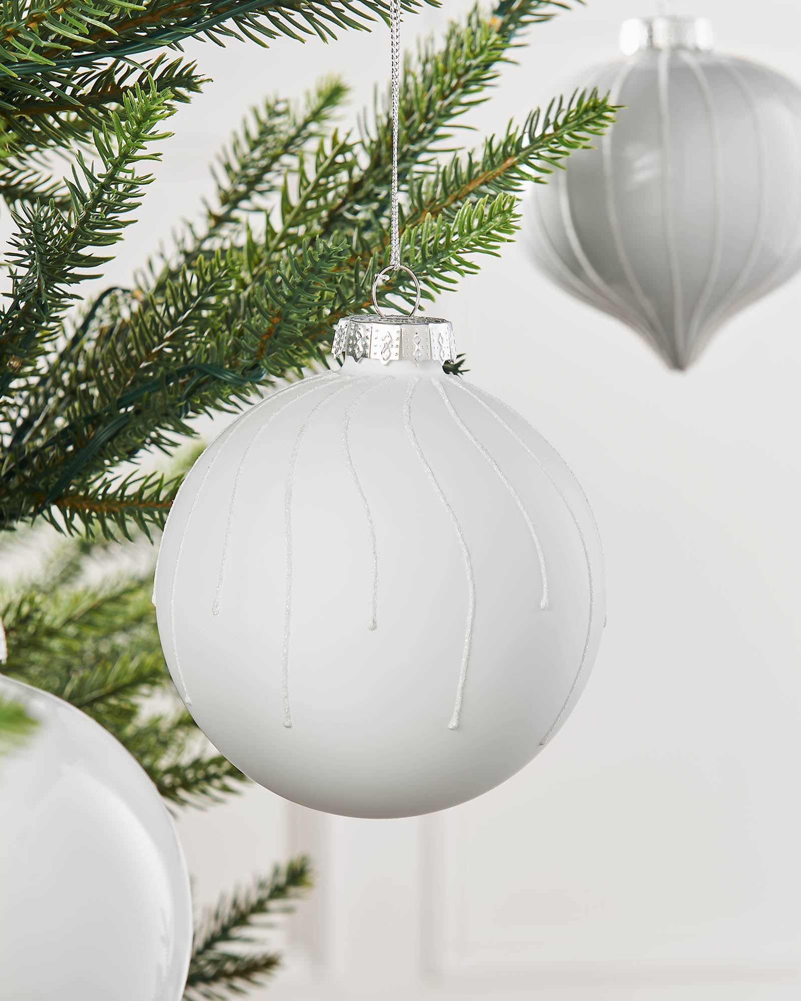 Six White Glass Baubles, 10 cm