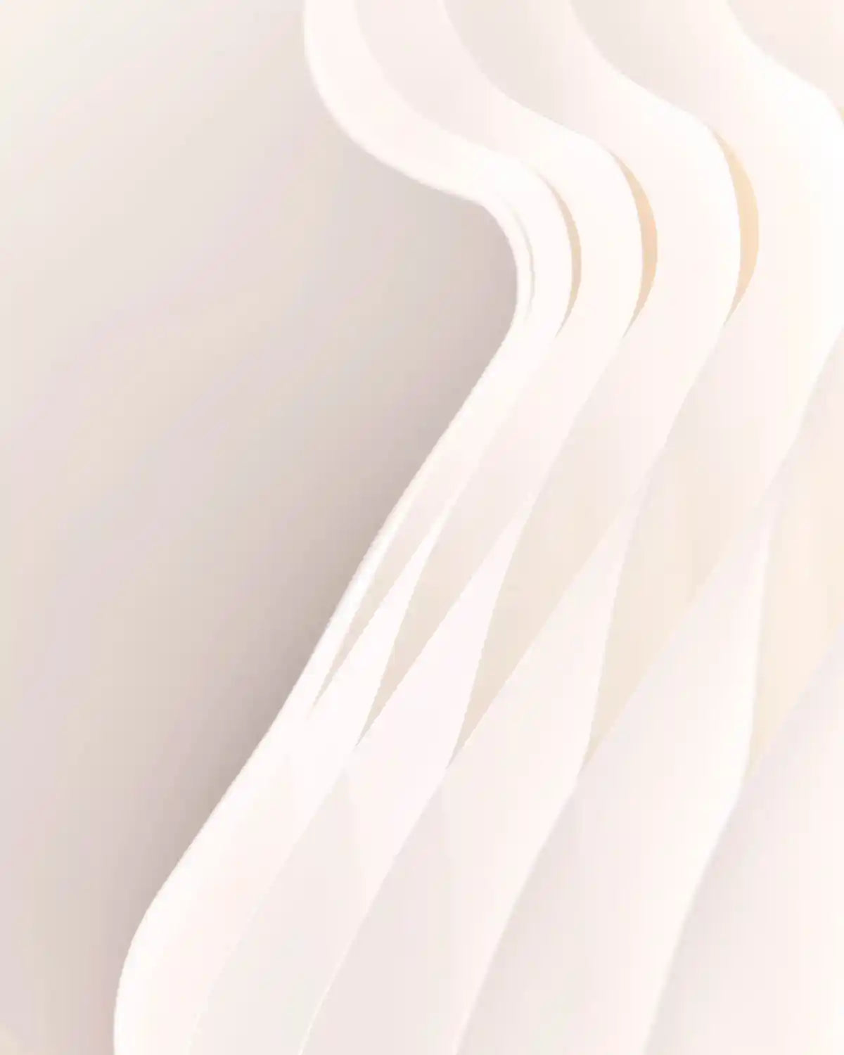 Close-up of the off-white honeycomb paper folds on a 3ft Christmas tree decoration.