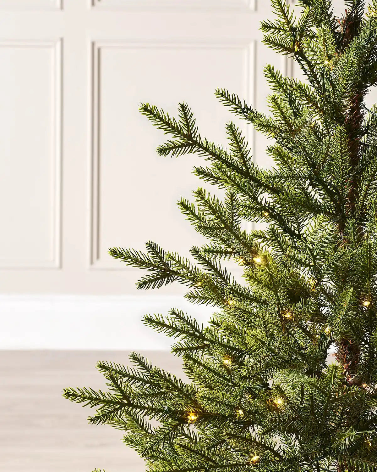 Close-up of realistic Douglas fir branches with warm white LEDs