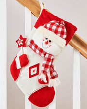 48cm red and cream snowman Christmas stocking hanging on a stair rail