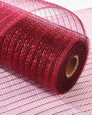 Burgundy mesh with red foil ribbon wrapped around a Christmas tree.