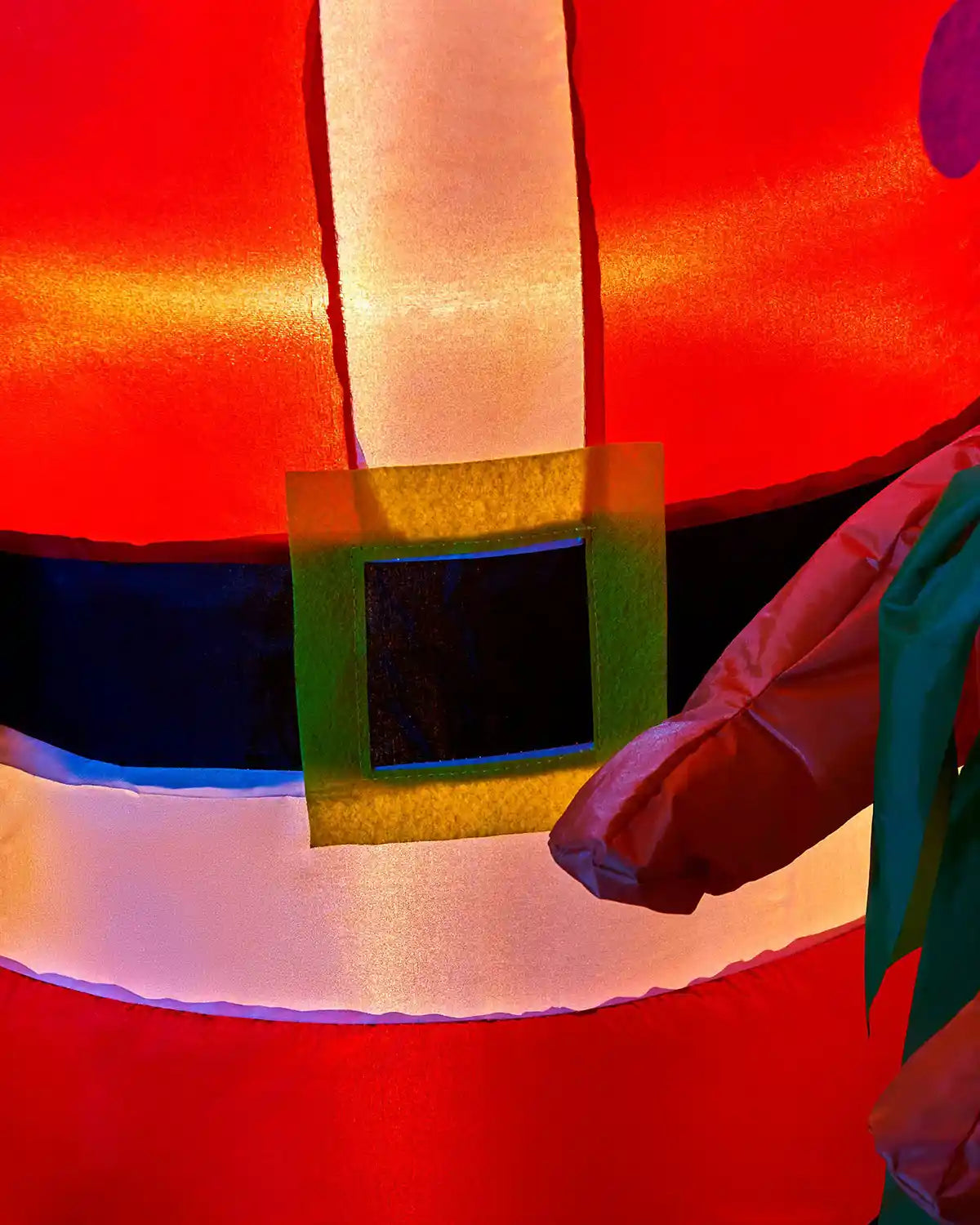 Close-up of the belt detail on the 4 ft pre-lit inflatable Santa display