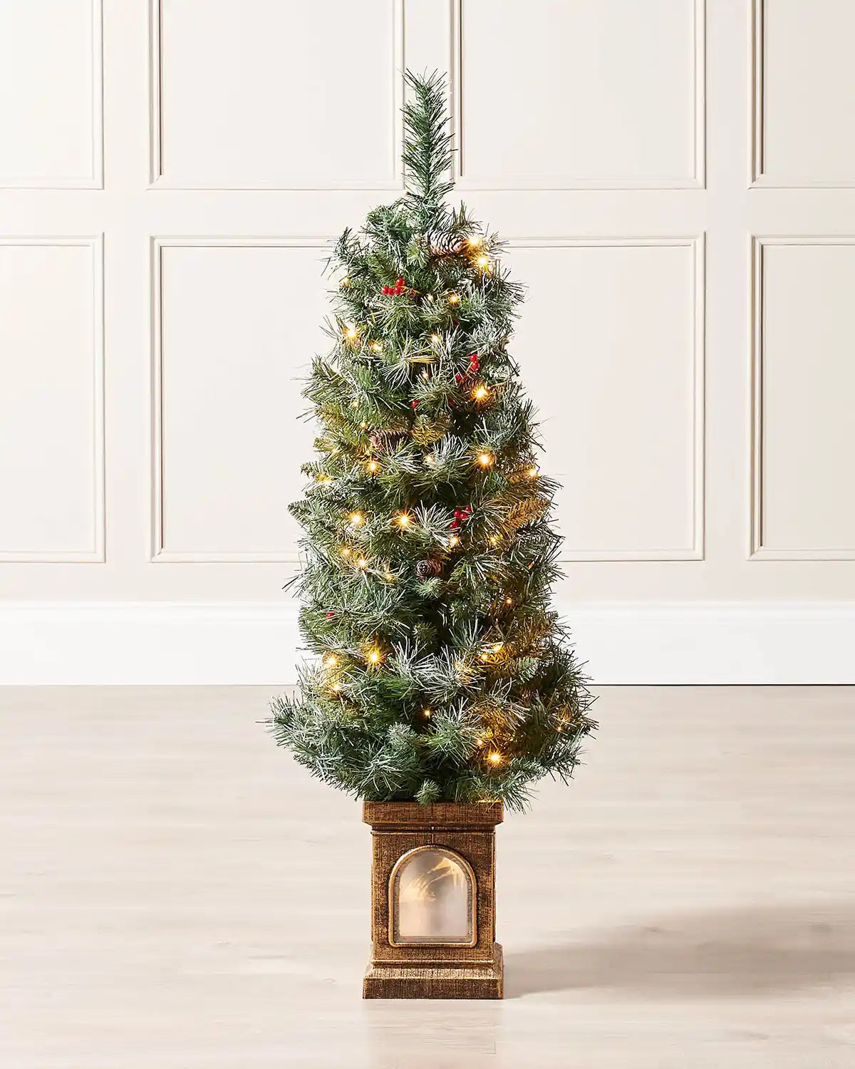 4 ft pre-lit Scandinavian Blue Spruce Christmas tree with frosted tips, berries and decorative pot