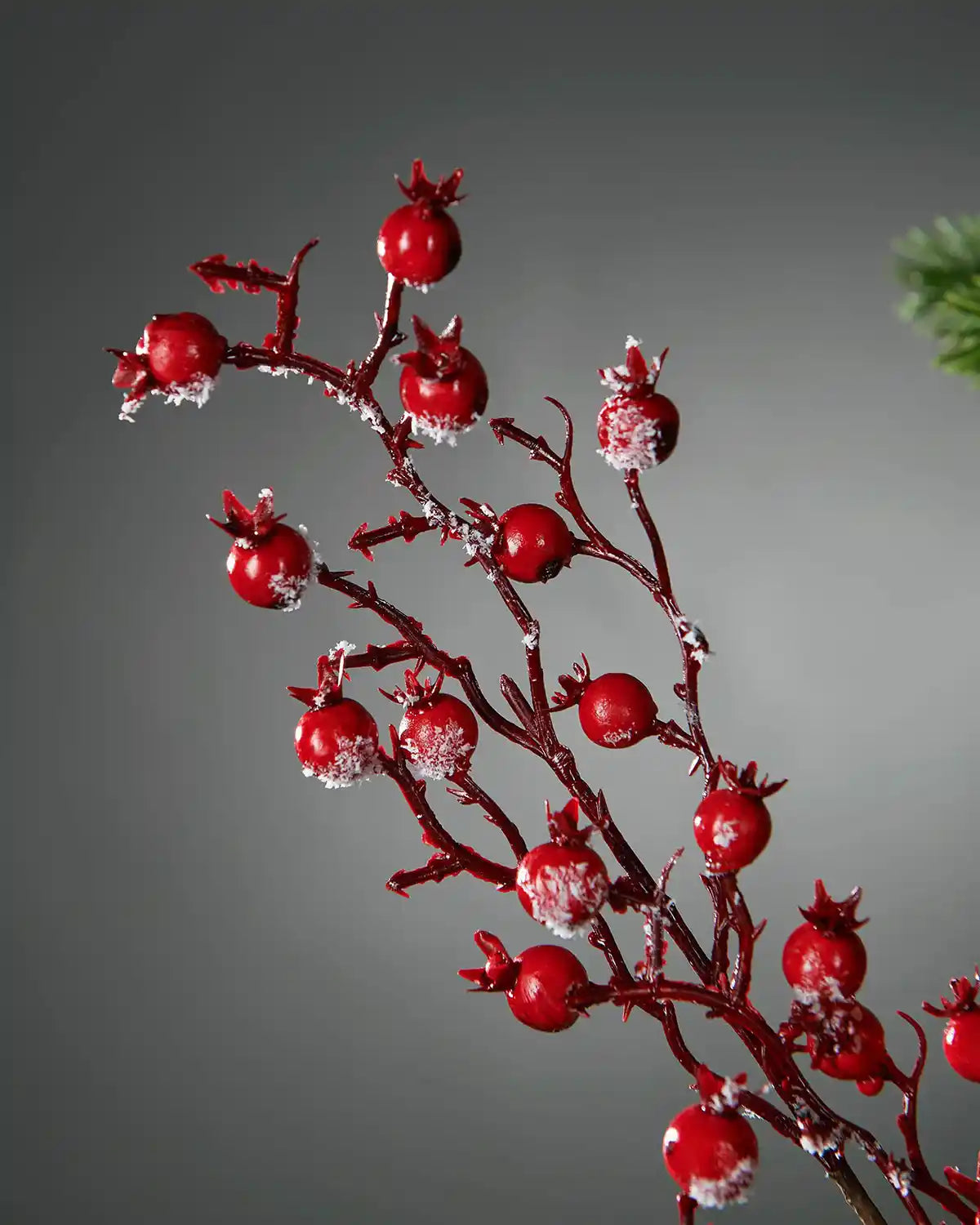 Detail of the glossy red berries and branching stems on the 57 cm artificial pick