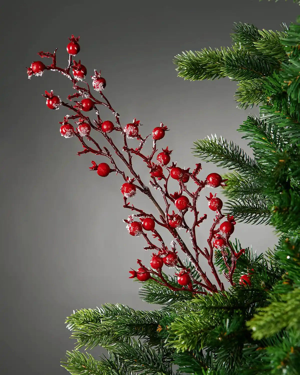 57 cm red artificial berries tree pick styled in a Christmas tree