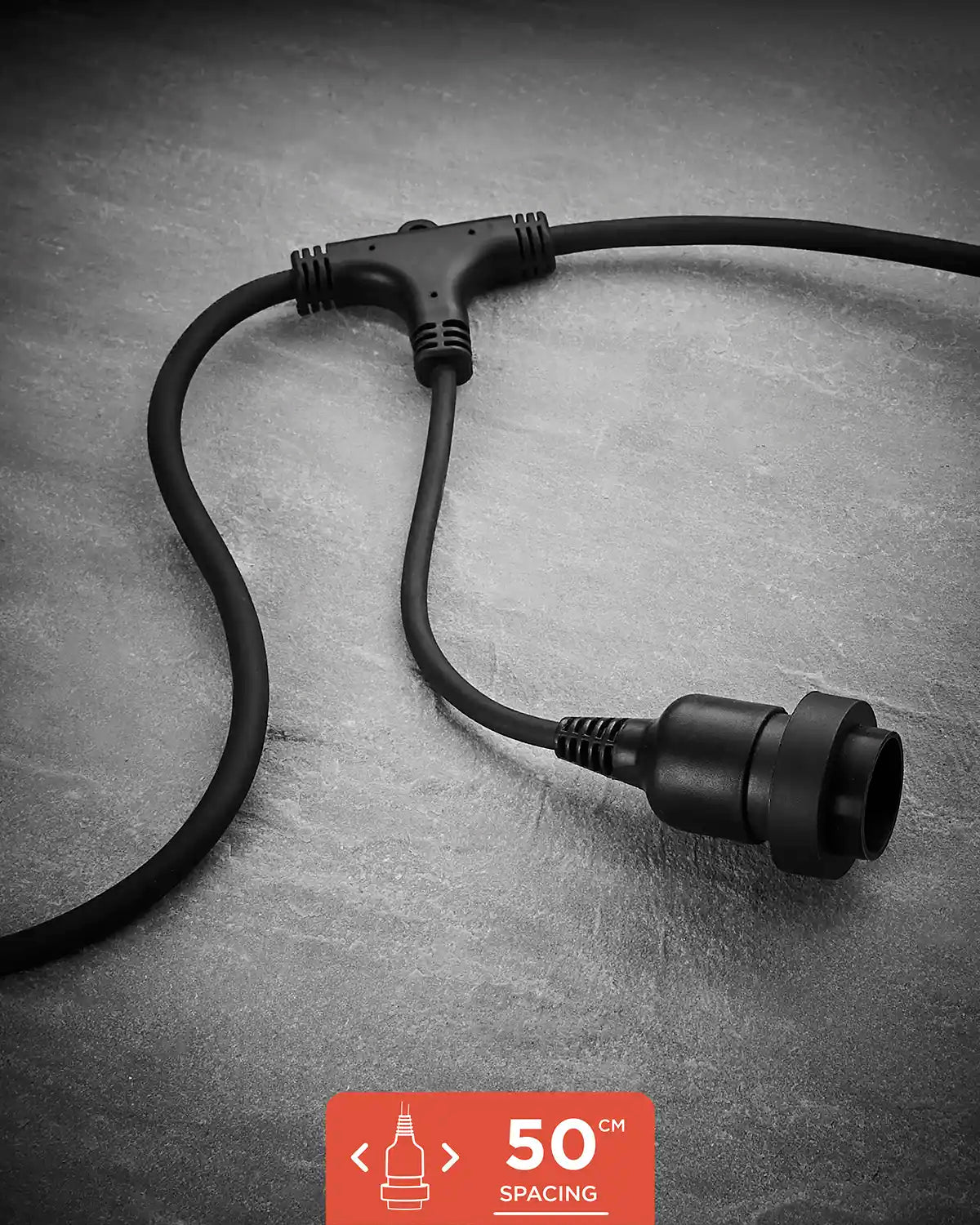 Black E27 long drop festoon belt with 50cm socket spacing shown on a grey surface.