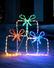 60cm pre-lit gift box silhouette display with three glowing parcels and coloured bows