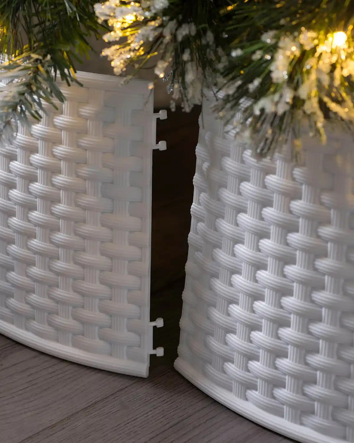 Close-up of the hinged panel on the 65 cm white rattan effect tree collar