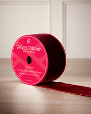 6 cm burgundy velvet ribbon on a spool with wired edge and 9 m length shown on the label.