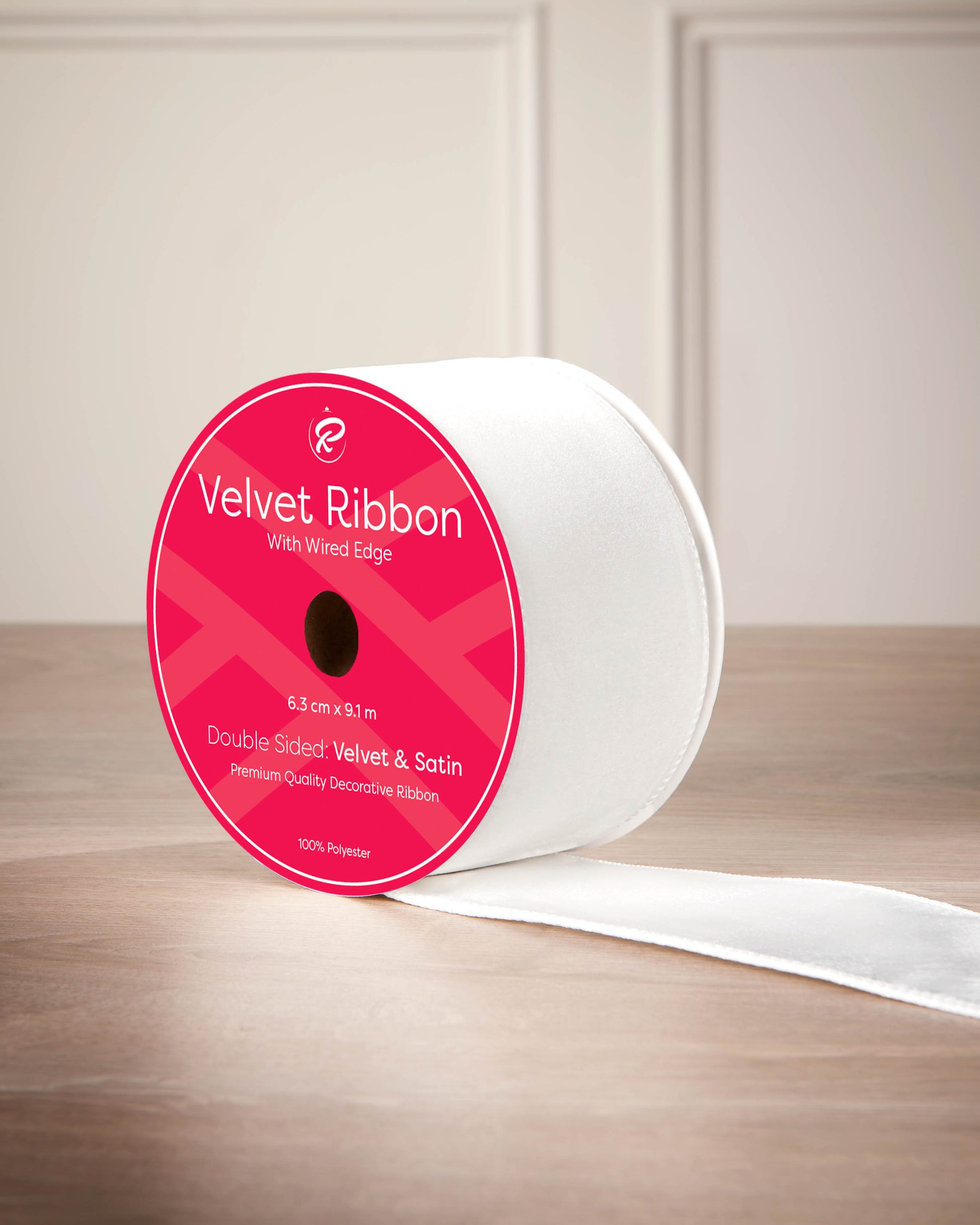 6 cm white velvet ribbon on a spool with wired edge and 9 m length shown on the label.