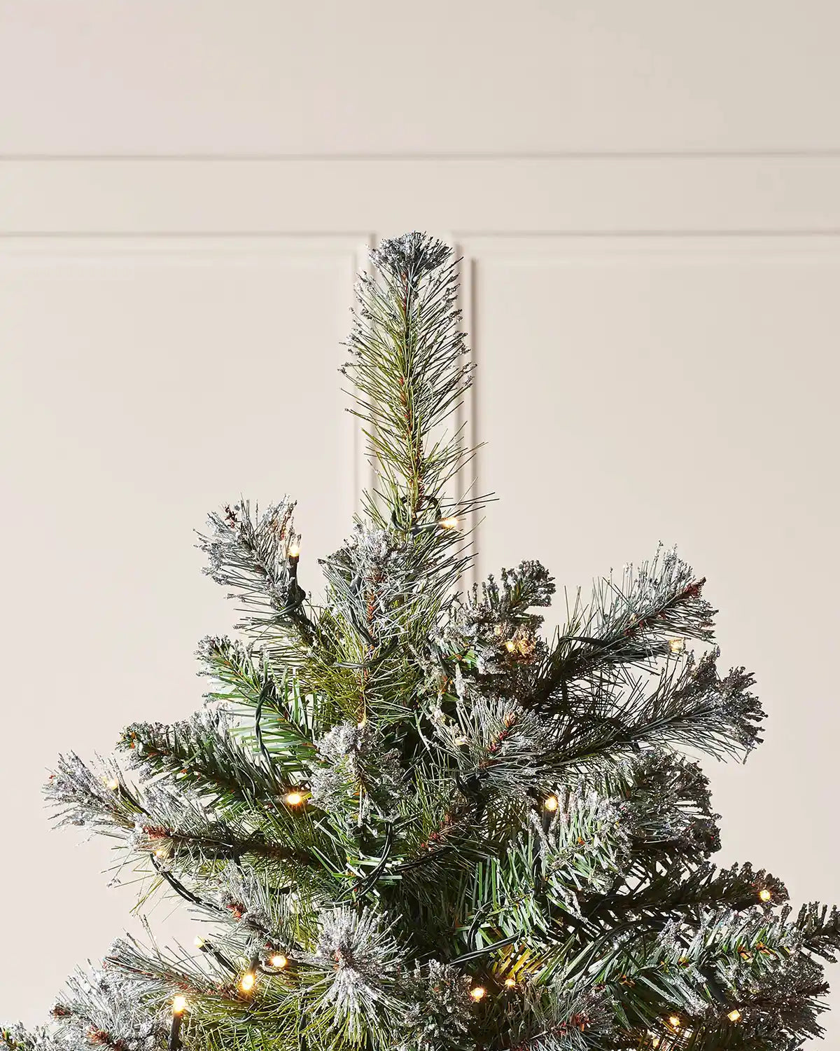 Close-up of the top branches and lights on the 6 ft Blue Brockton Spruce tree