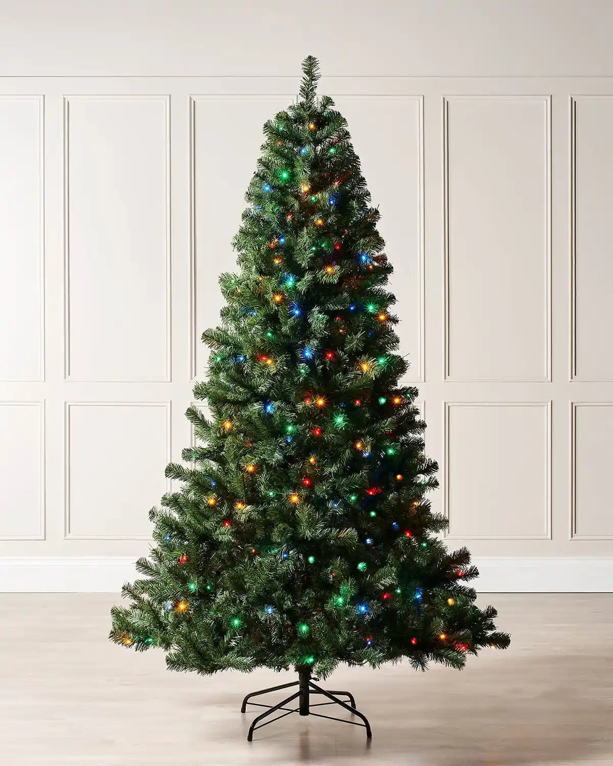 6 ft pre-lit emerald spruce Christmas tree with multi-coloured LEDs and a metal tree stand