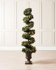 6 ft pre-lit spiral potted Christmas tree displayed indoors with warm white lights