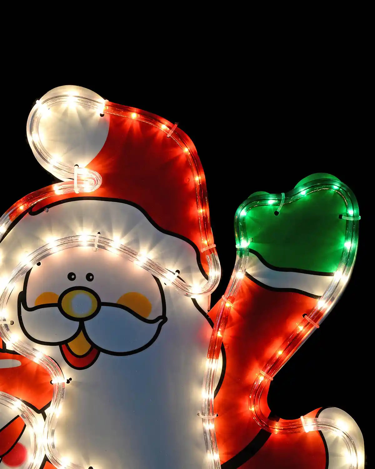 Close-up of Santa’s hat and glove on the multi-coloured LED rope light display