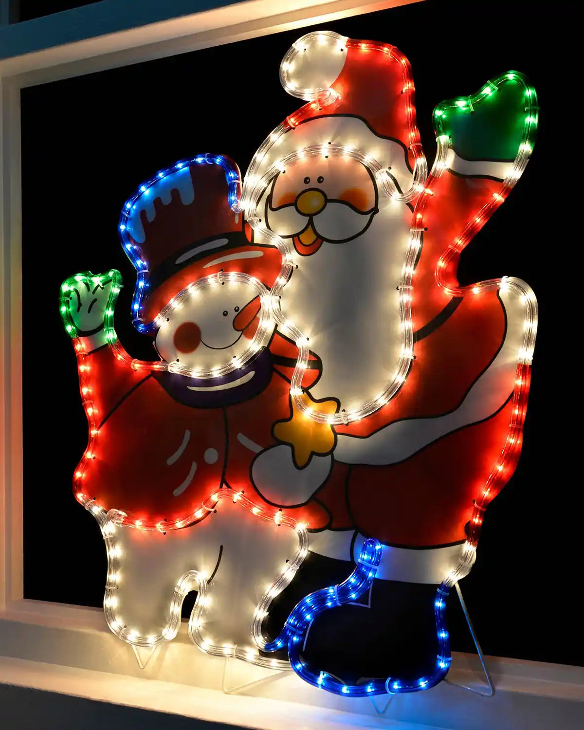 71 cm Santa and snowman rope light displayed in a window with fold-out stands