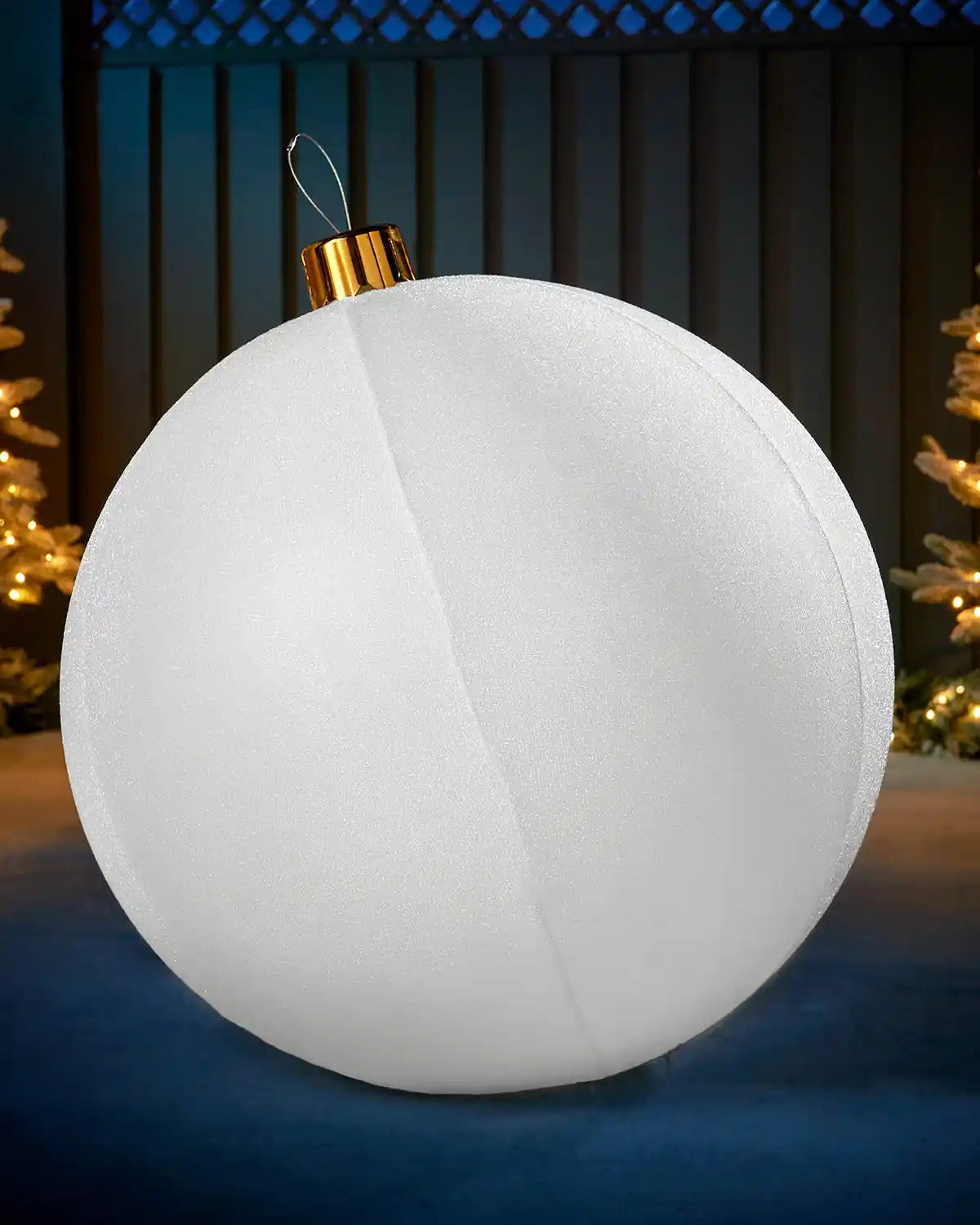 Large white 76cm inflatable tinsel Christmas bauble with a gold cap in an outdoor festive display.