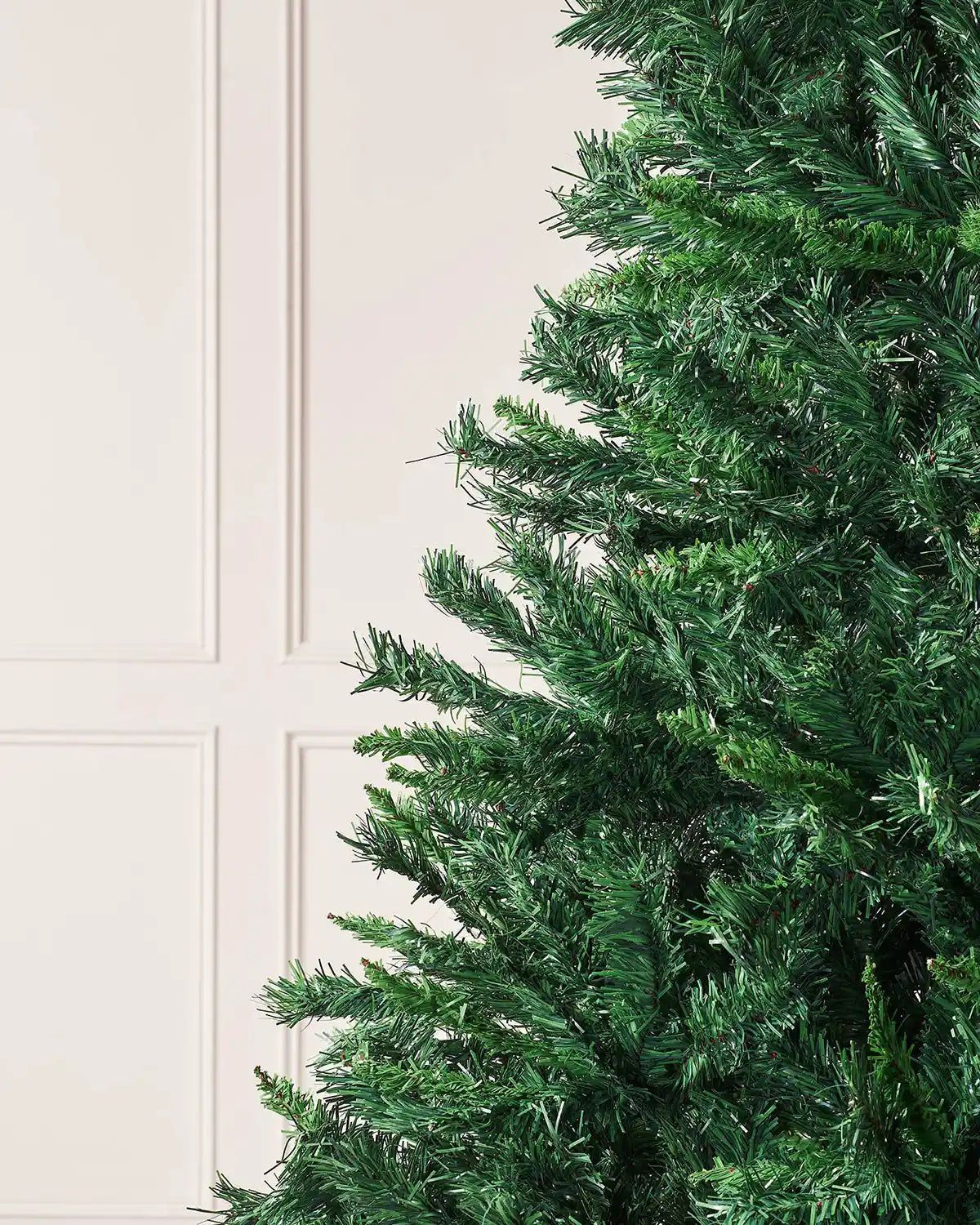 Close-up of green mixed pine artificial Christmas tree branches