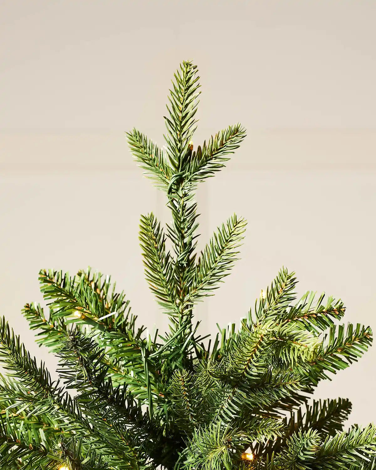 Close up of the top of 7ft Himalayan Fir Christmas Tree with lights, PE and PVC tips