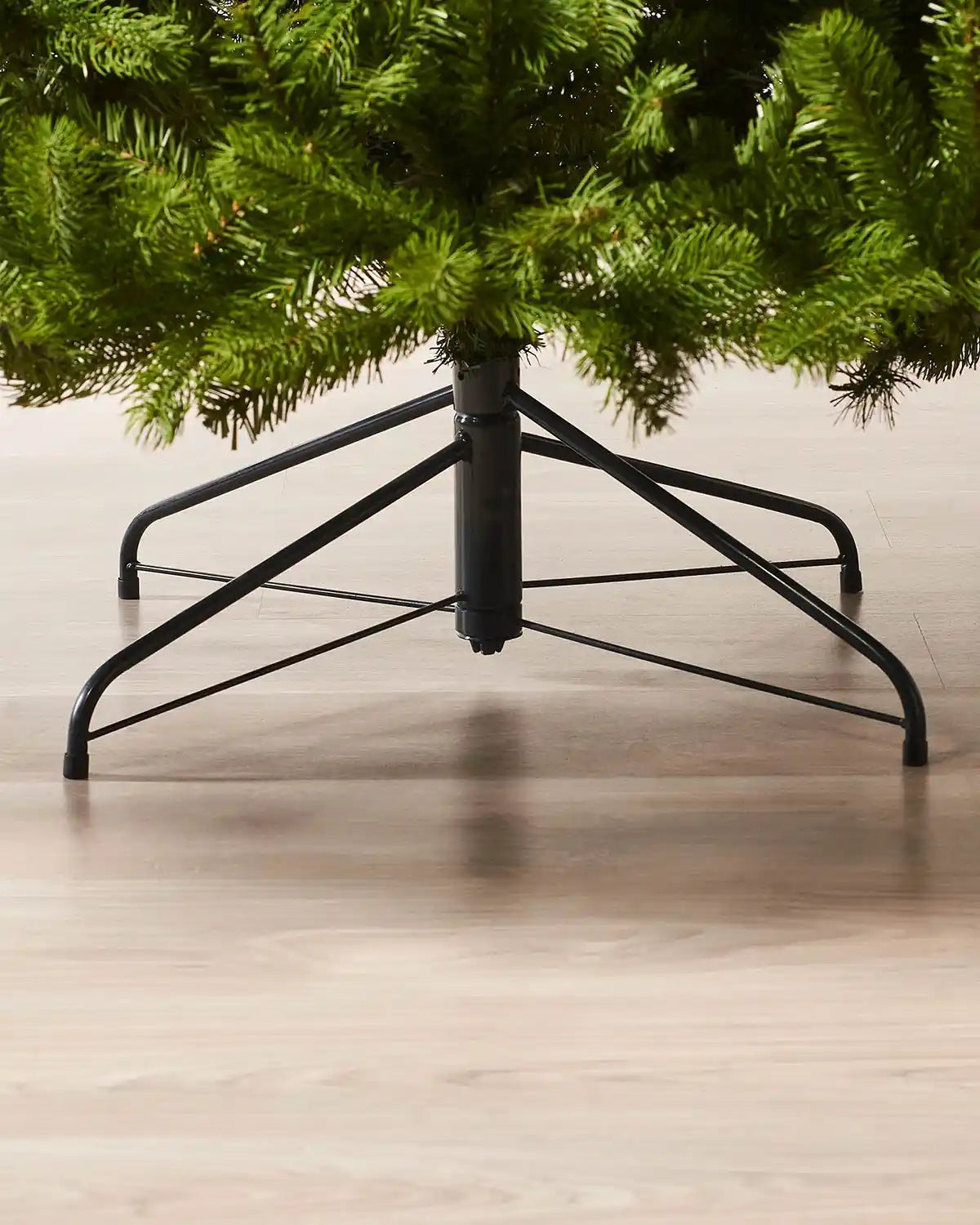 Close up of the base of 7ft Mixed Pine Christmas tree Black tree stand 