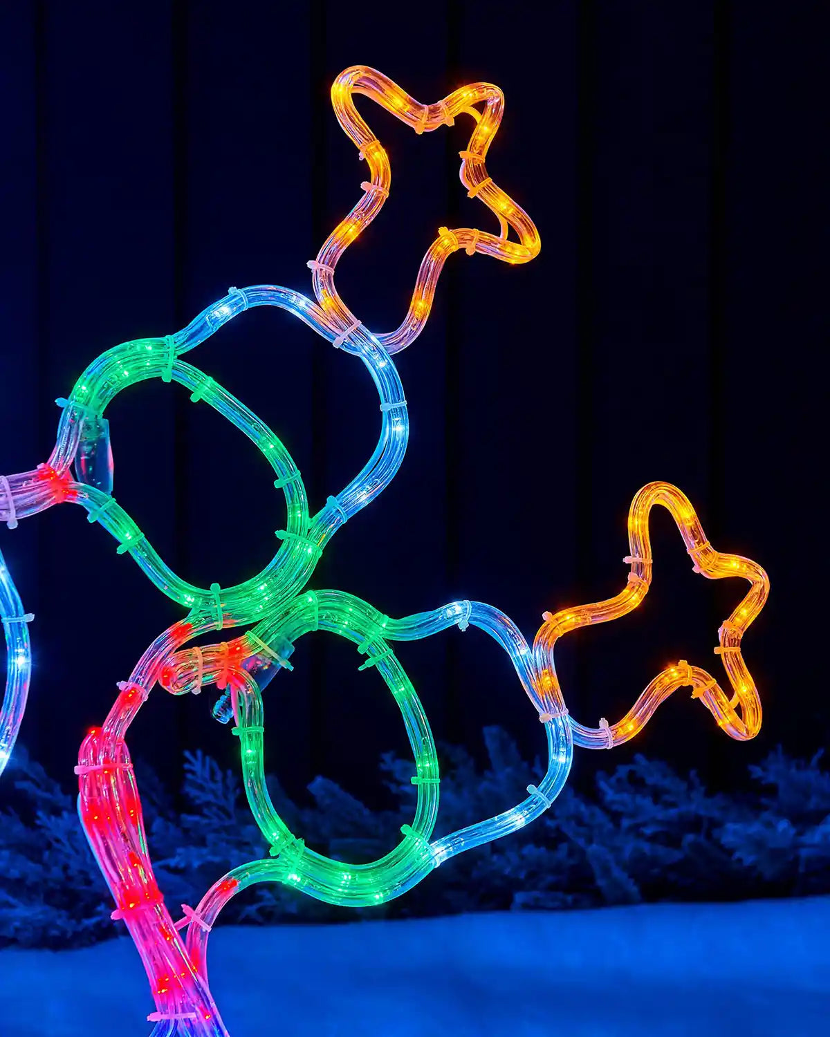 Close-up of the star shapes on the 90cm multi-coloured Santa rope light