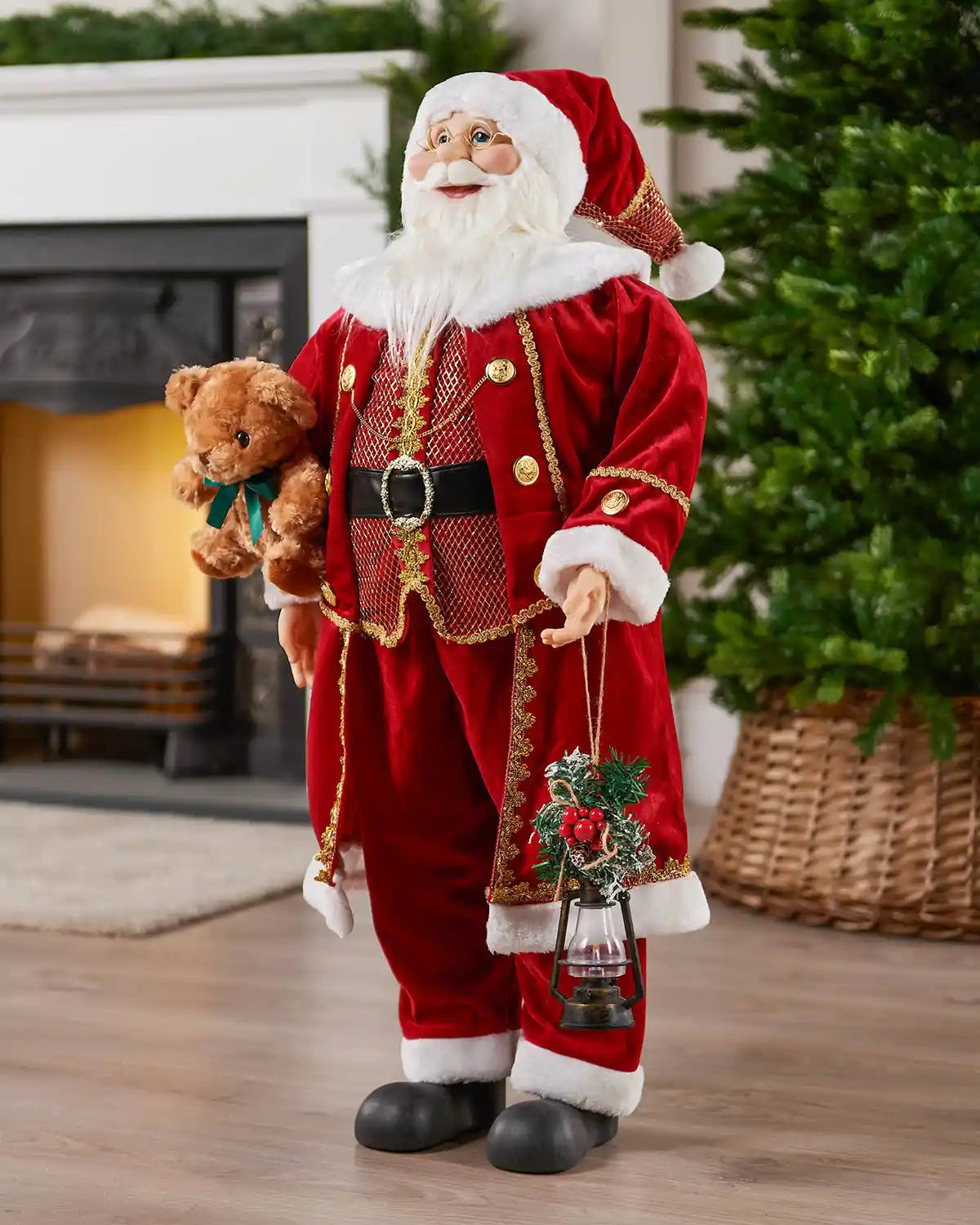 90 cm standing Santa figurine displayed beside a fireplace and Christmas tree