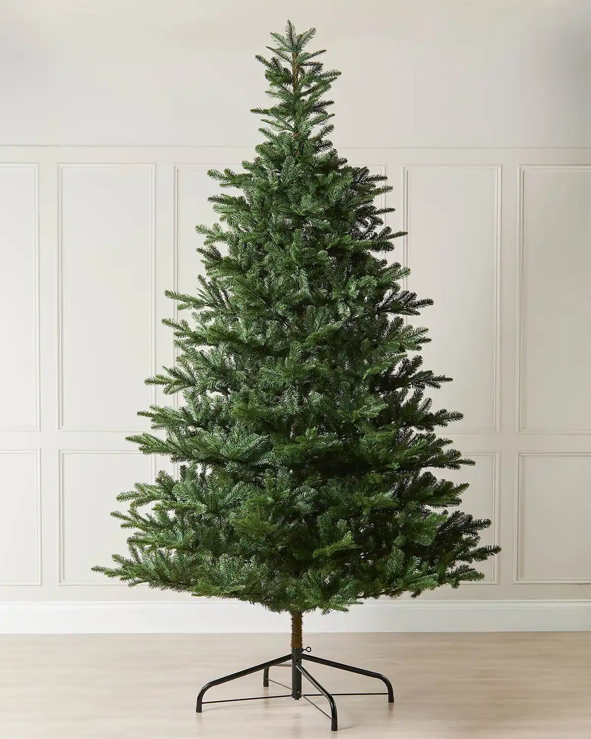 9ft Nordmann fir Christmas tree displayed indoors with a full natural shape