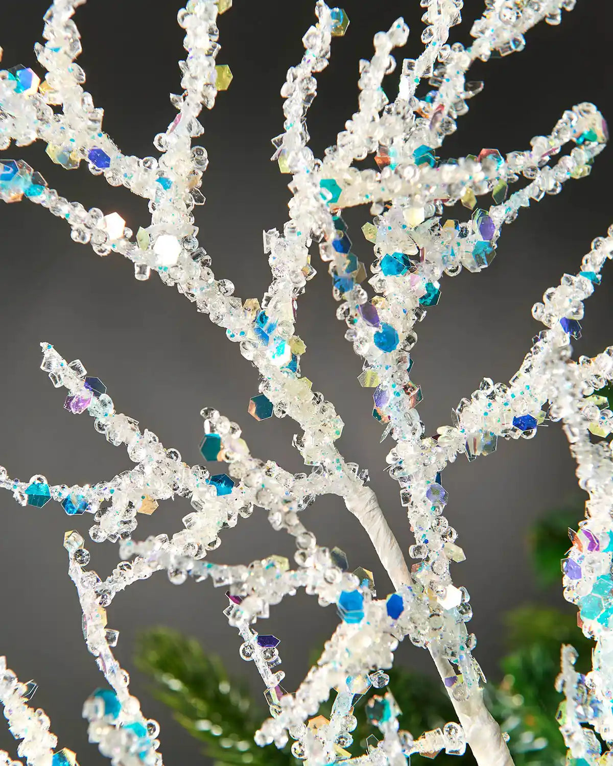 Additional close-up image of white beaded crystal spray highlighting iridescent nature of sequins