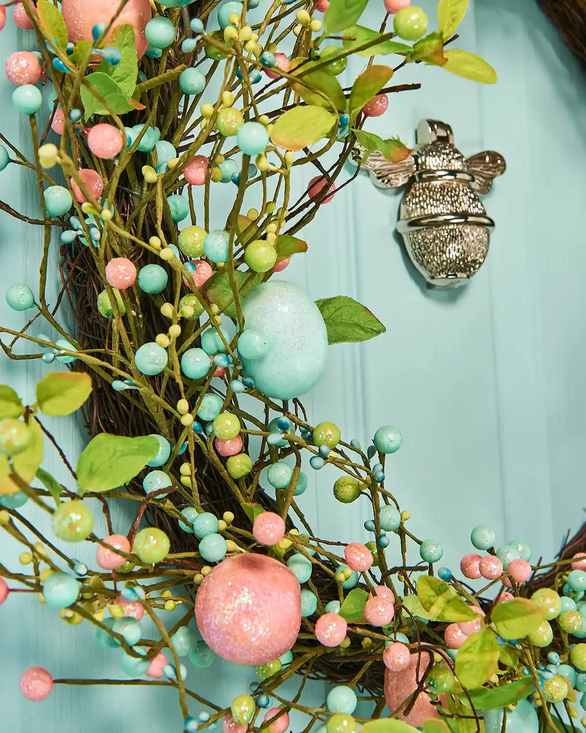 Artificial Floral Egg Spring Wreath, Blue & Pink, 28 Inch  foliage close up on a low angle