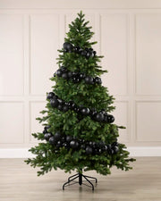 Black Bauble Garland decorating a Christmas tree