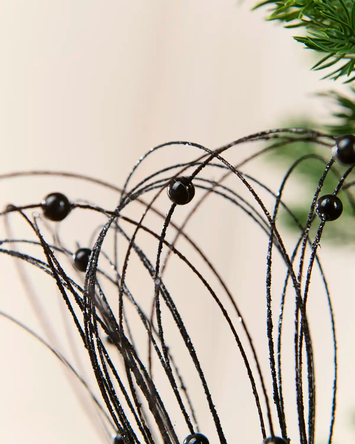 Black Glitter Nest Christmas Tree Pick highlighting the glitter details and Black balls
